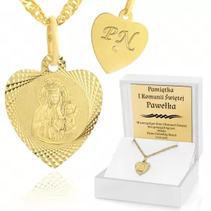złoty medalik w kształcie serca na pierwszą komunię świętą
